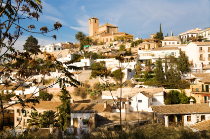 View of Albayzin, Granada, Spain. On top of the hill San Cristób